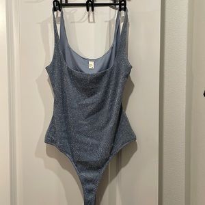 Sparkly blue body suit